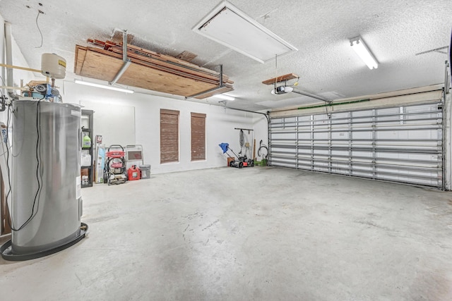 garage with electric water heater and a garage door opener