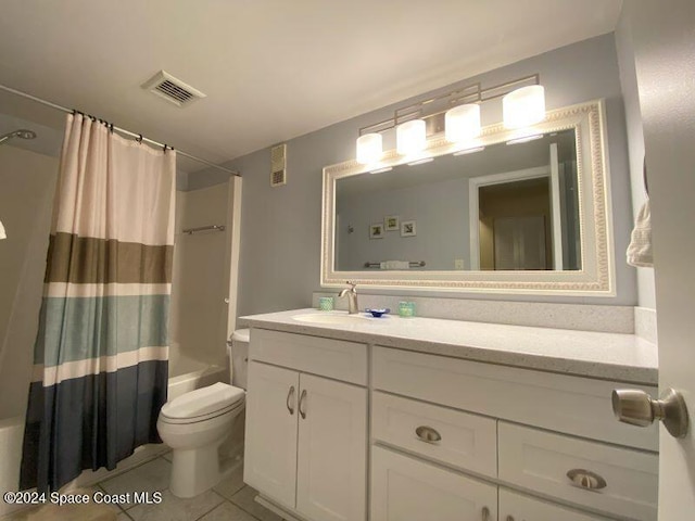 full bathroom with shower / tub combo, tile patterned flooring, vanity, and toilet