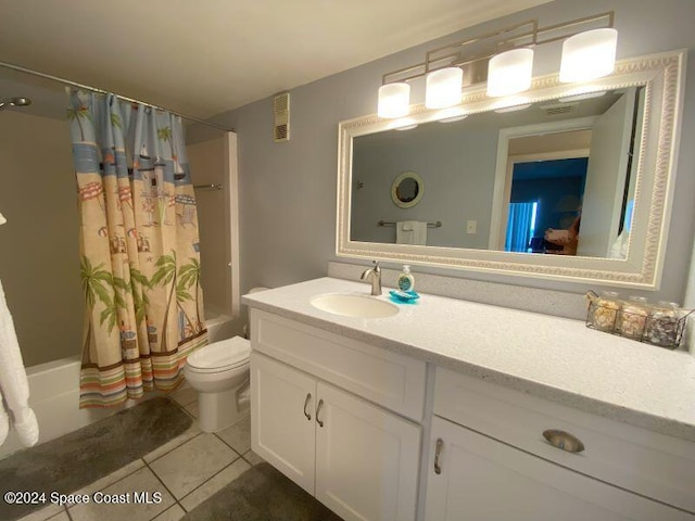 full bathroom featuring toilet, tile patterned flooring, shower / bath combo, and vanity