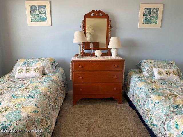 bedroom featuring light carpet