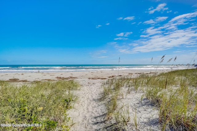 property view of water featuring a beach view