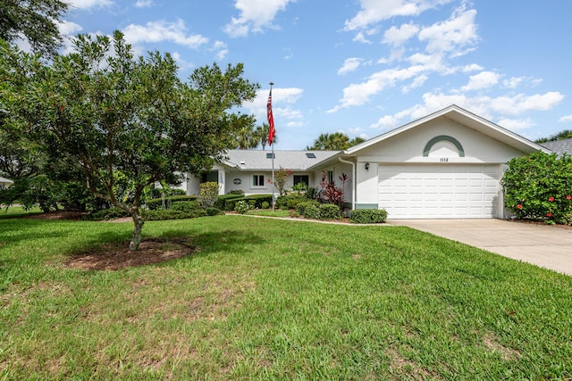 ranch-style house with a garage and a front yard