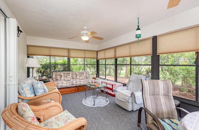 sunroom / solarium with ceiling fan