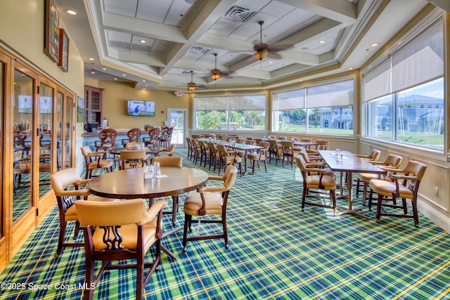 carpeted dining room with beamed ceiling, coffered ceiling, and ceiling fan