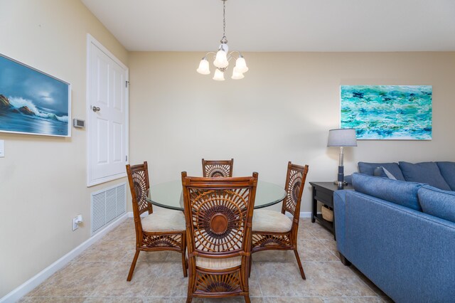 dining room featuring a notable chandelier