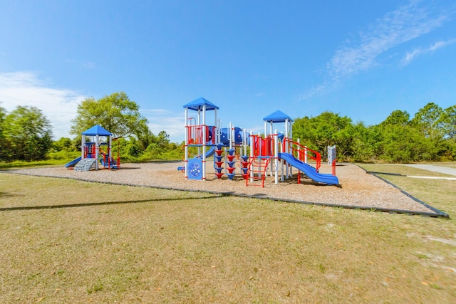 view of playground featuring a yard