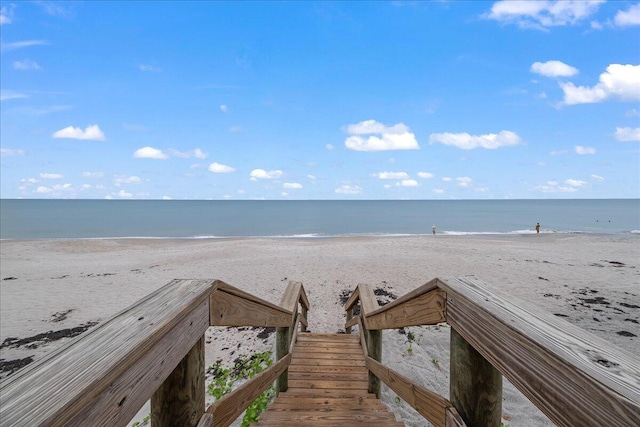 property view of water featuring a beach view