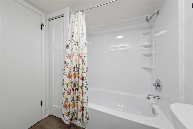 bathroom with shower / bath combination with curtain