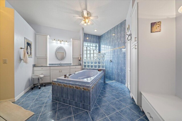 bathroom with vanity, ceiling fan, tile patterned floors, and separate shower and tub