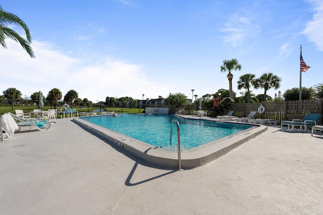 view of pool featuring a patio