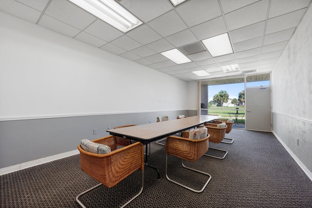 office with carpet flooring and a paneled ceiling