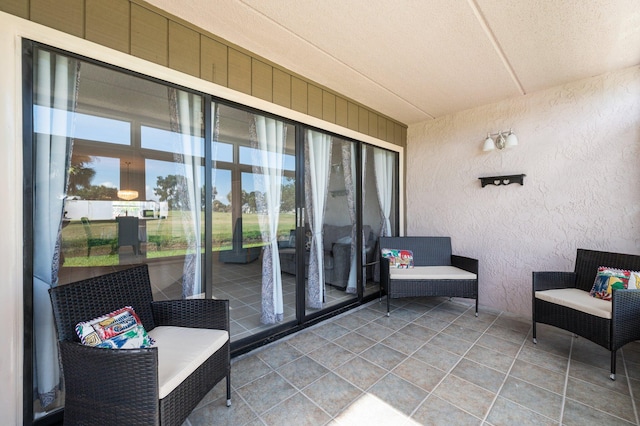 view of patio with a balcony