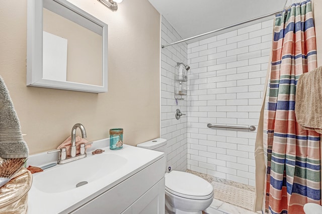 bathroom with vanity, a shower with shower curtain, and toilet