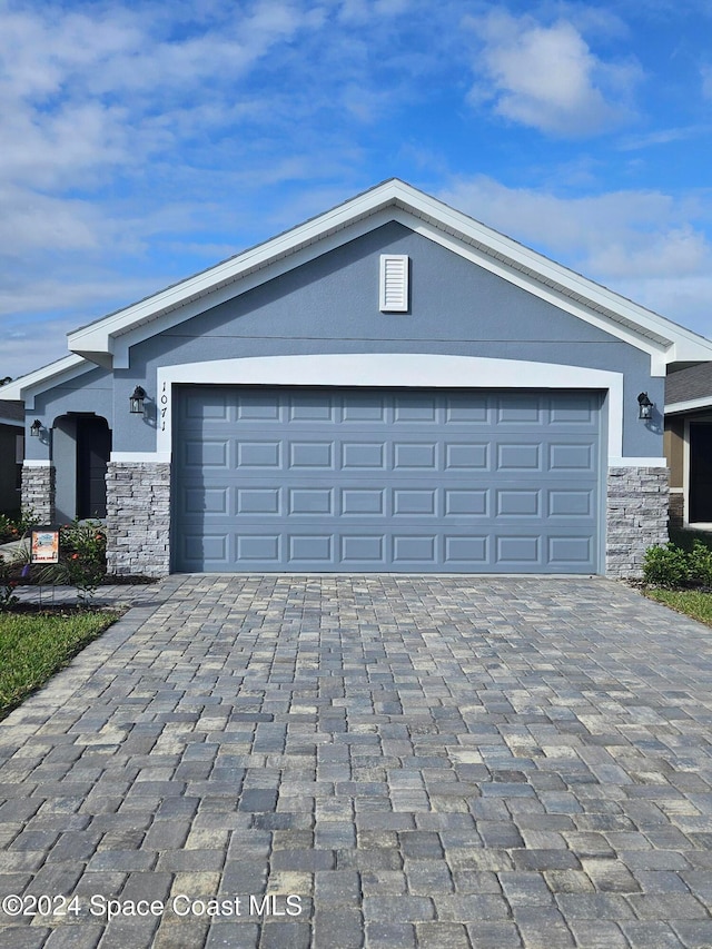 exterior space with a garage