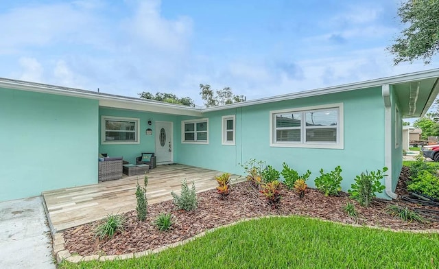 rear view of property with a deck