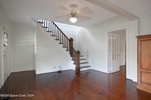 staircase with wood-type flooring