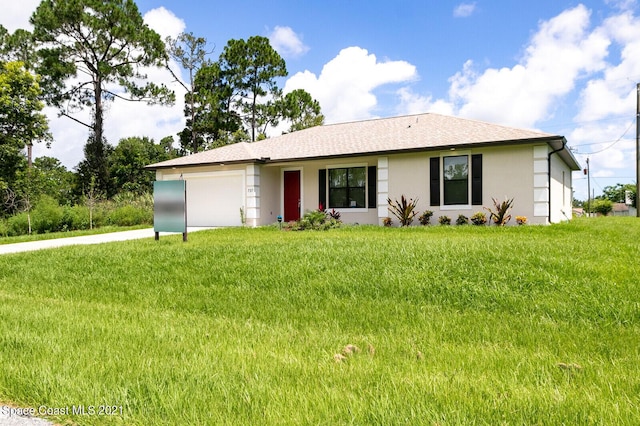 1071 Grapefruit Rd SE, Palm Bay, FL 32909 - ranch-style house with an attached garage, a front yard, driveway, and stucco siding