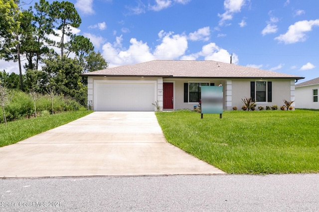 1071 Grapefruit Rd SE, Palm Bay, FL 32909 - ranch-style house with a garage, driveway, a front lawn, and stucco siding
