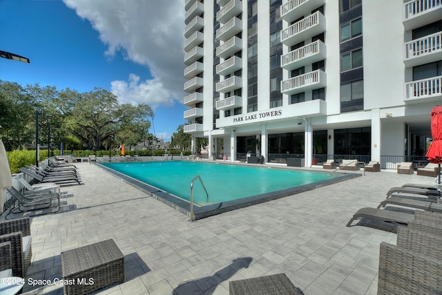 view of pool with a patio area