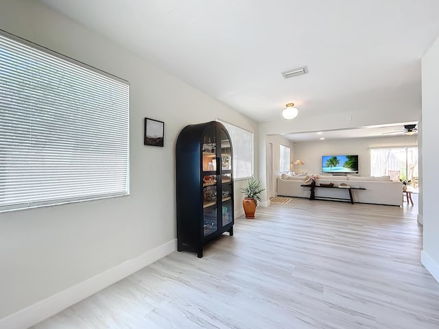 hall featuring light wood-type flooring