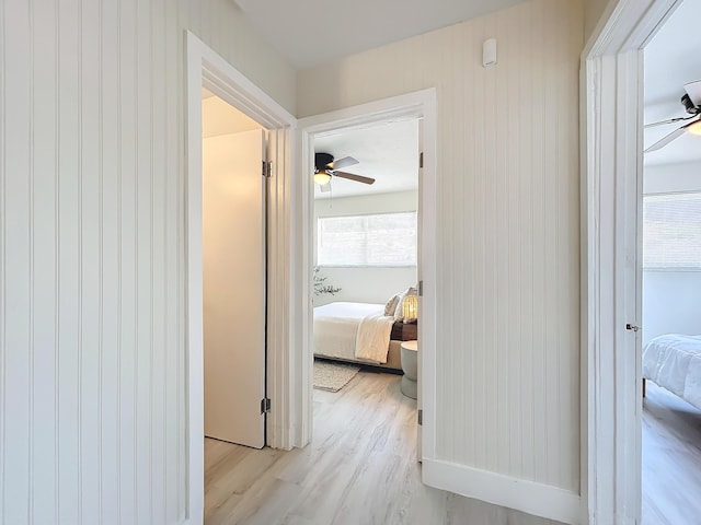 corridor featuring light hardwood / wood-style flooring