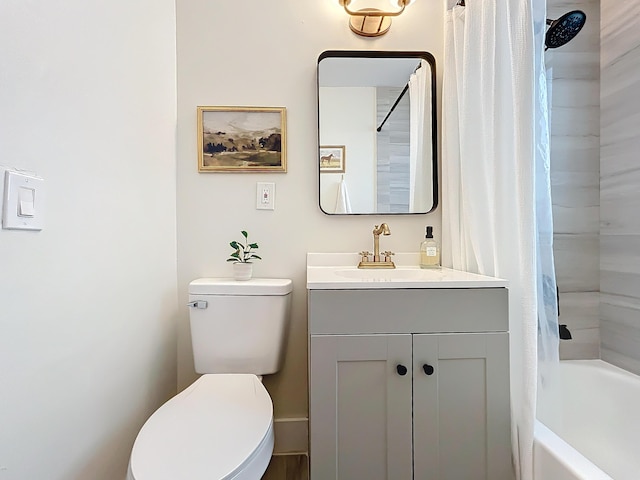 full bathroom with vanity, shower / bath combination with curtain, and toilet