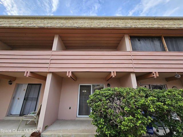 doorway to property featuring a patio