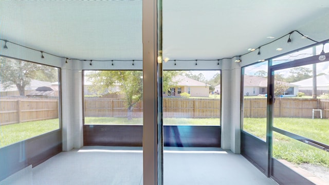 sunroom featuring a healthy amount of sunlight