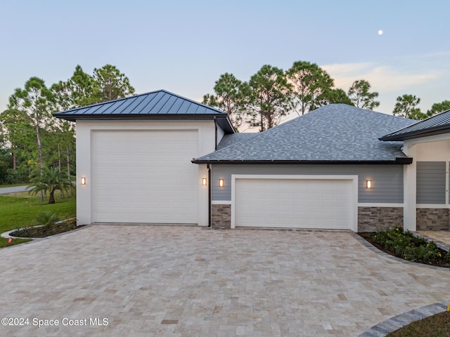 view of front of home featuring a garage