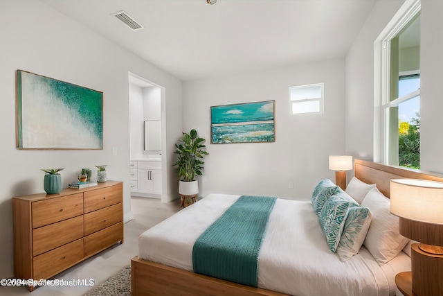 bedroom with ensuite bath