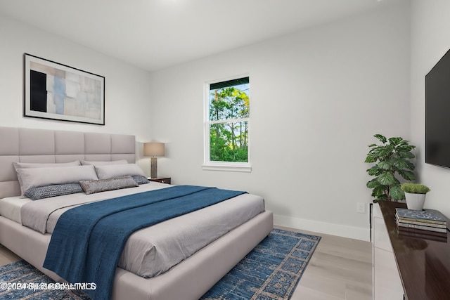 bedroom featuring hardwood / wood-style floors