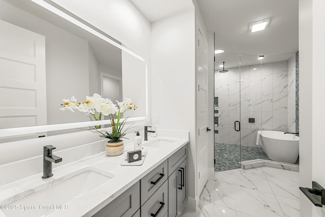 bathroom featuring vanity and separate shower and tub