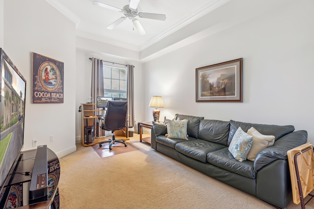 carpeted living room with ceiling fan and crown molding