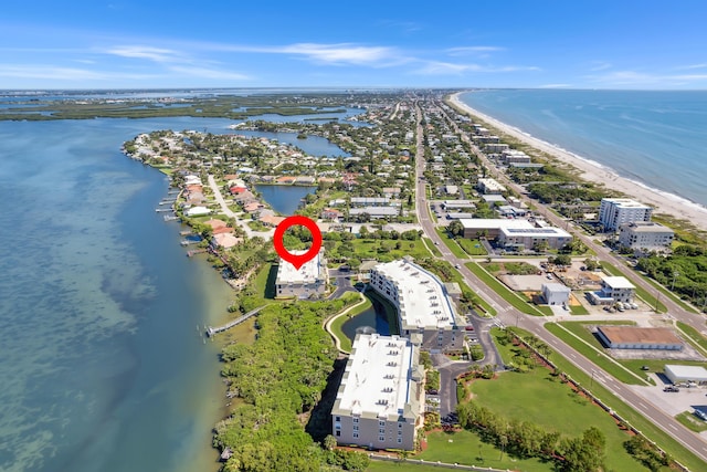 aerial view with a beach view and a water view