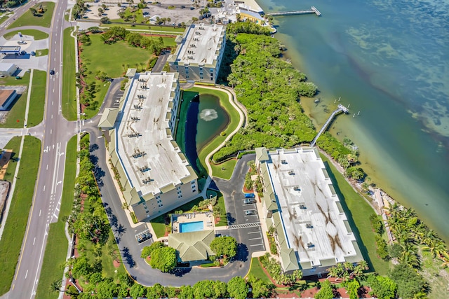 birds eye view of property featuring a water view