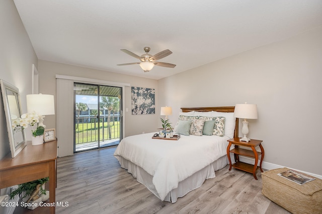 bedroom with access to outside, ceiling fan, and light hardwood / wood-style floors