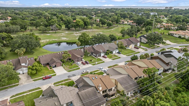 bird's eye view with a water view, view of golf course, and a residential view