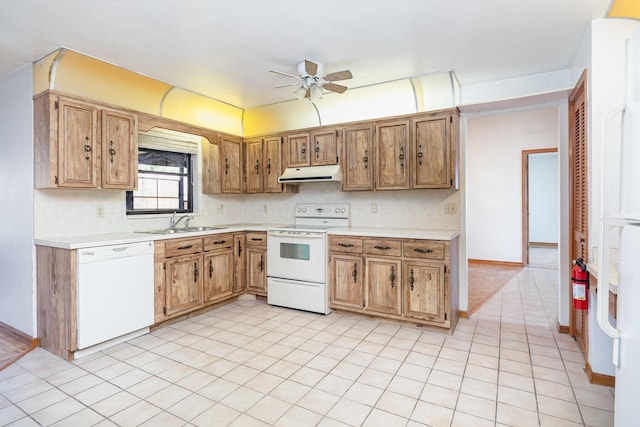 kitchen featuring ceiling fan, sink, white appliances, and tasteful backsplash