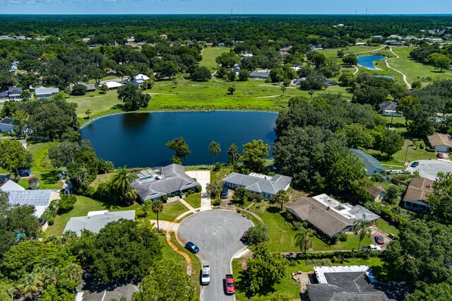 drone / aerial view with a water view