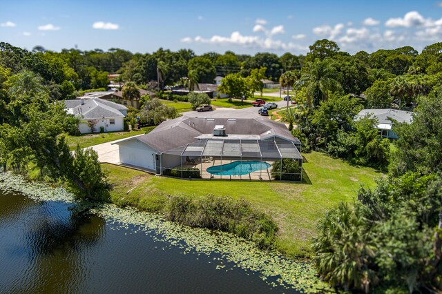 drone / aerial view with a water view