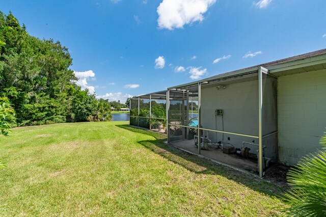 view of yard featuring a lanai