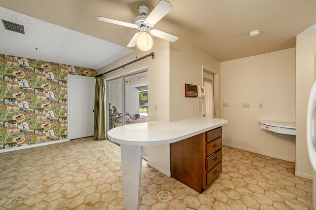 bathroom with vanity, ceiling fan, and tile patterned floors