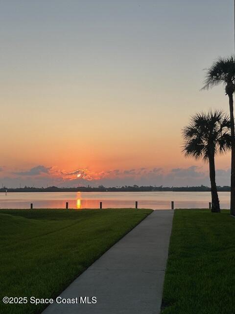 250 S Sykes Creek Pkwy Unit 309, Merritt Island, FL 32952 - view of home's community featuring a lawn and a water view