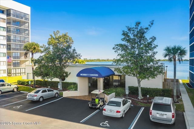 250 S Sykes Creek Pkwy Unit 309, Merritt Island, FL 32952 - view of uncovered parking lot