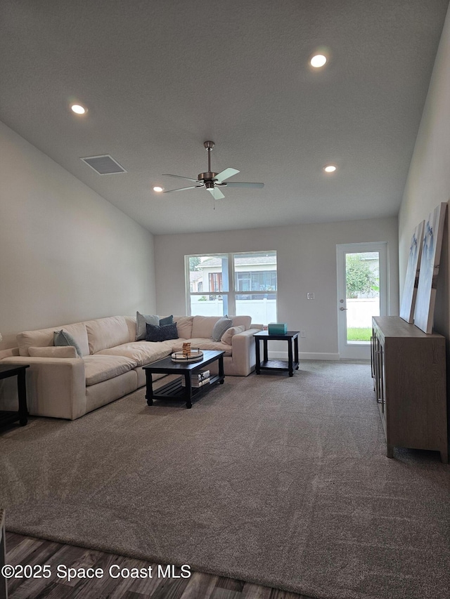 920 Lyons Cir NW, Palm Bay, FL 32907 - living area with ceiling fan, recessed lighting, baseboards, and carpet floors