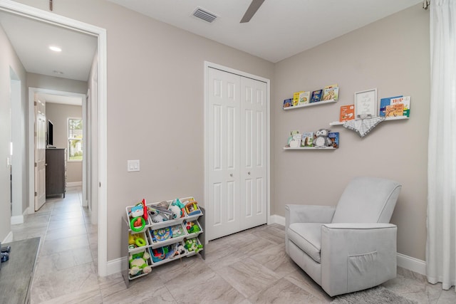 playroom with ceiling fan