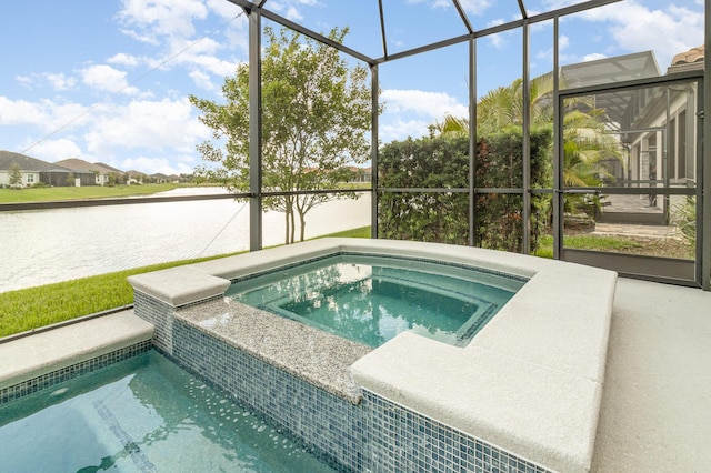 view of swimming pool with an in ground hot tub, a water view, and a lanai