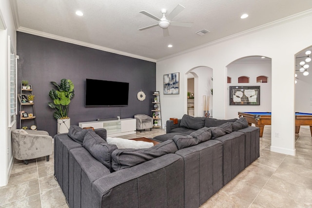 living area with pool table, a ceiling fan, visible vents, baseboards, and ornamental molding