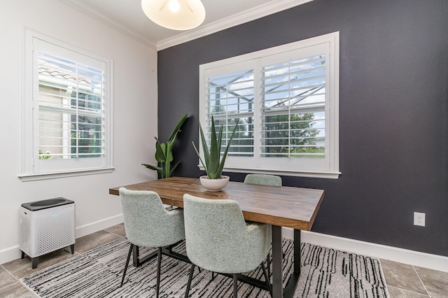 dining area featuring ornamental molding