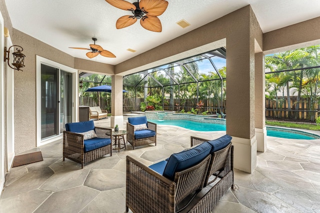 view of patio with ceiling fan, a fenced in pool, and an outdoor living space